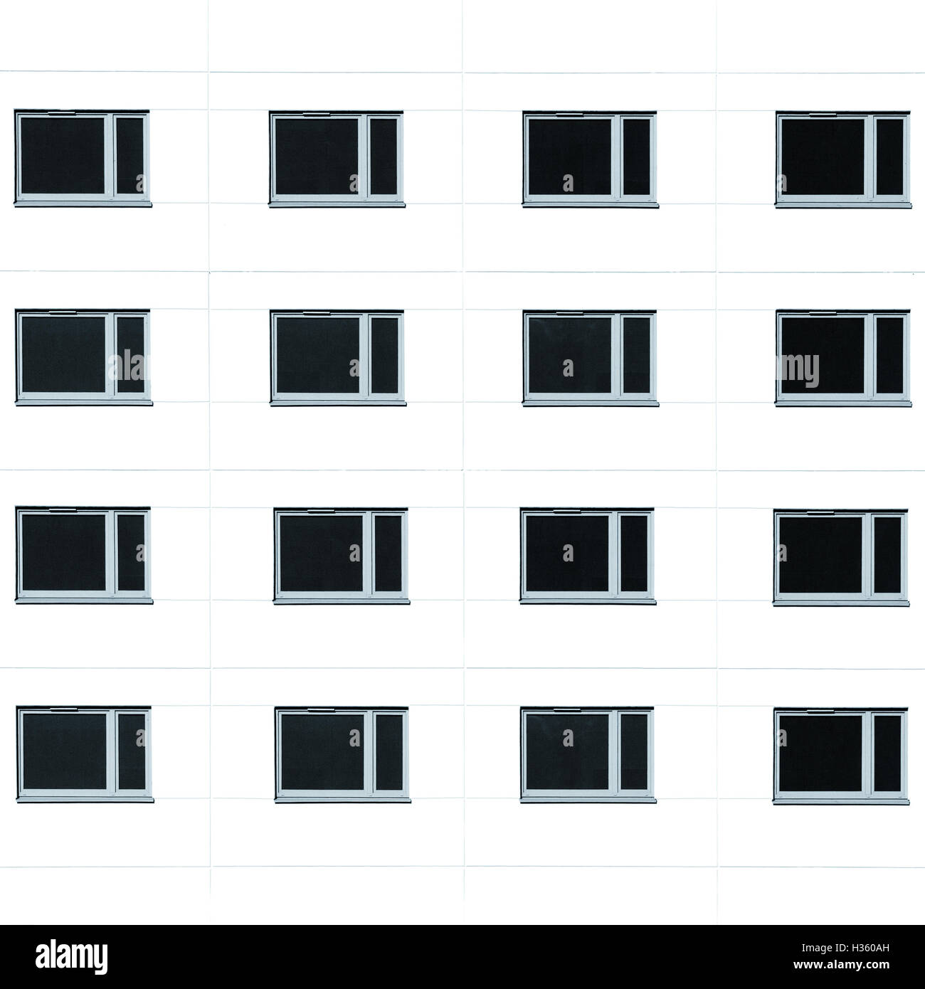 Modern residential building windows background. Monochromatic square picture Stock Photo