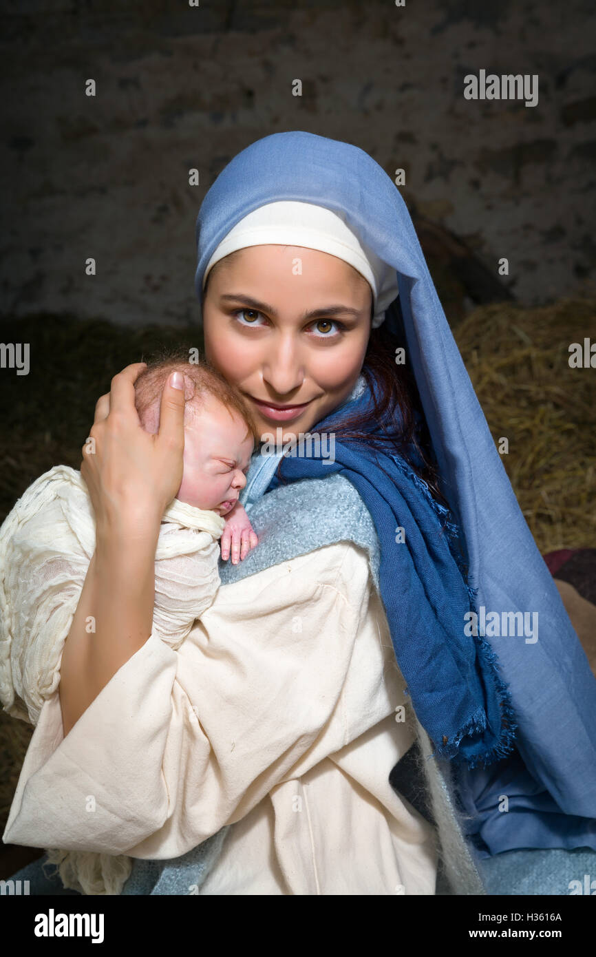 Live Christmas nativity scene in an old barn Reenactment play with