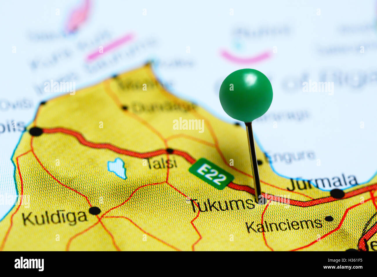 Tukums pinned on a map of Latvia Stock Photo
