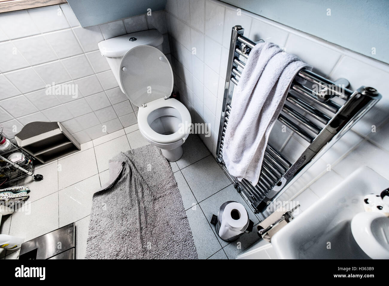 Wide angle view of a small bathroom and toilet Stock Photo