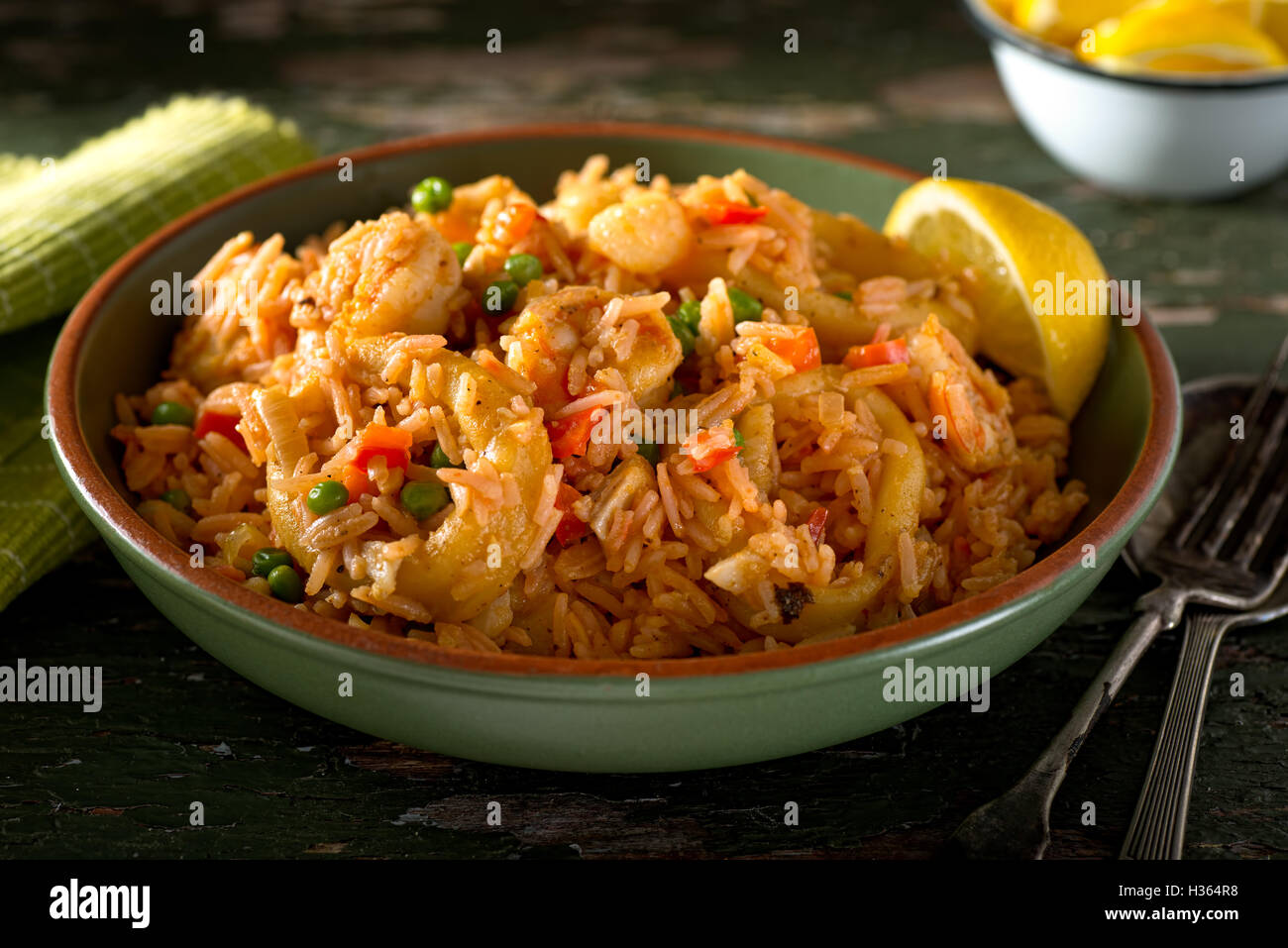 A bowl of delicious cuban Arroz con Mariscos - rice with seafood. Stock Photo