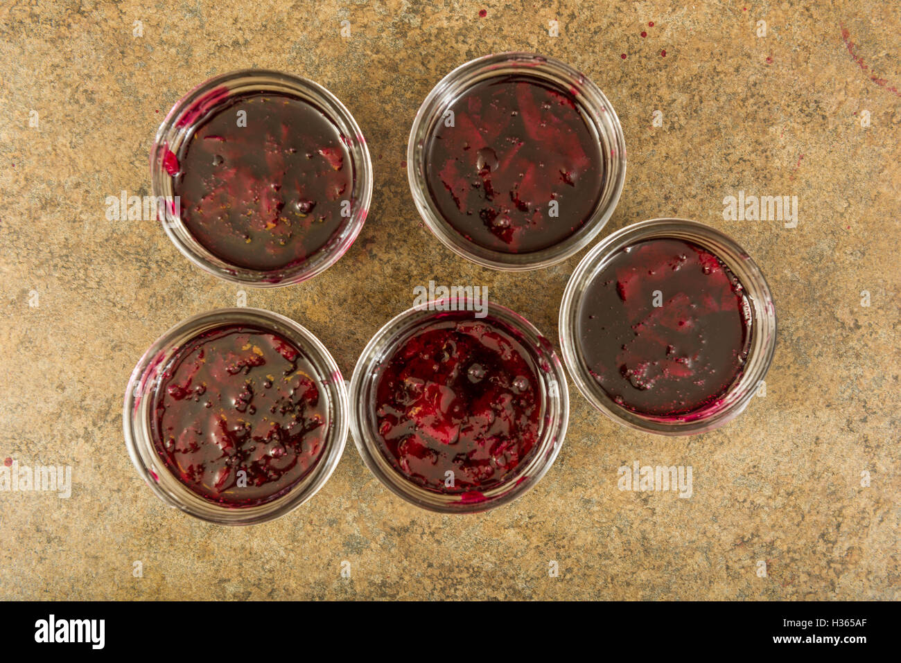 Jam ready to be sealed for storage Stock Photo Alamy