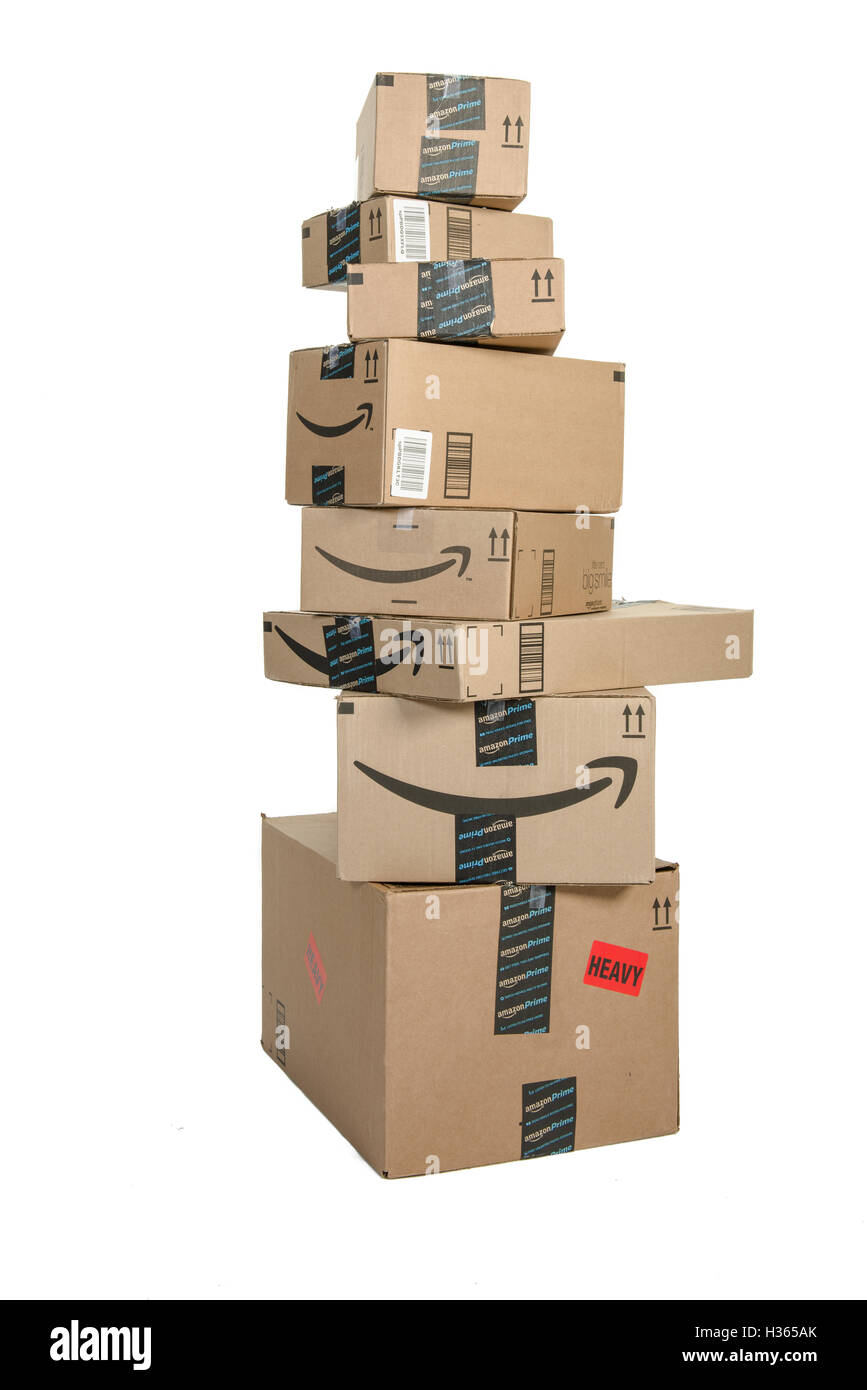 Winneconne, WI - 21 September 2016:  Bunch of Amazon boxes stacked on an isolated background. Stock Photo
