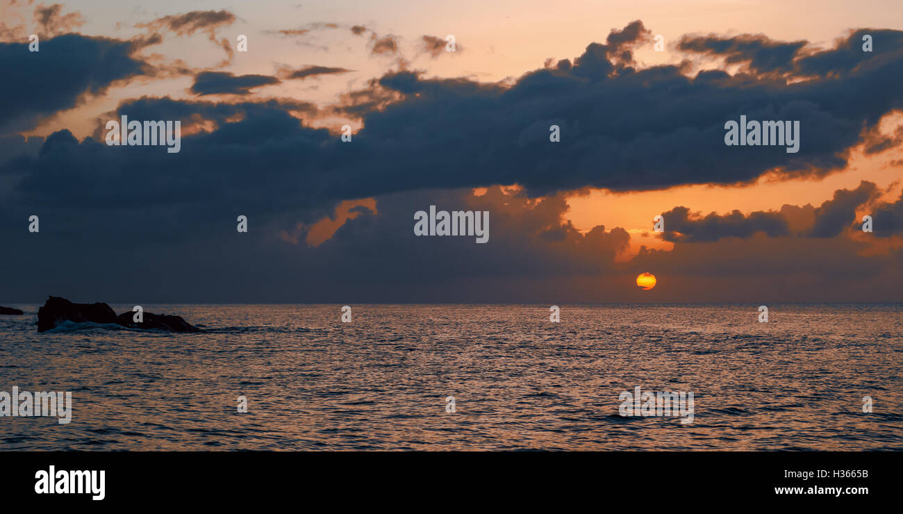 Sunset panoramic view of the sea and the horizon in Tobago Caribbean Stock Photo