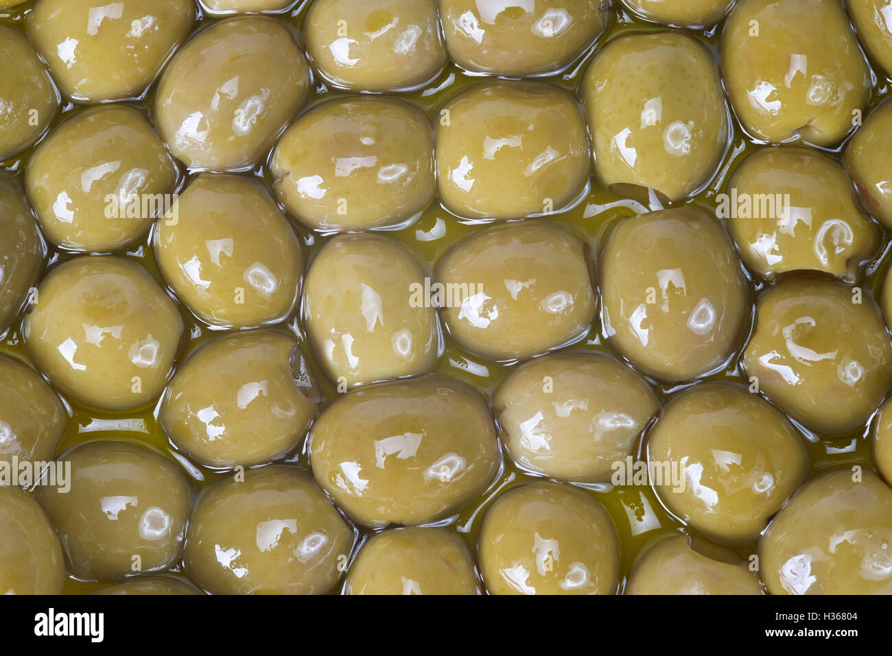 Texture of pitted olives covered in olive oil and ready to eat Stock Photo Alamy