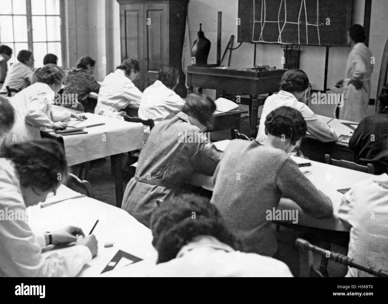 Classes in the German Master School for Fashion in Munich, 1931 Stock Photo