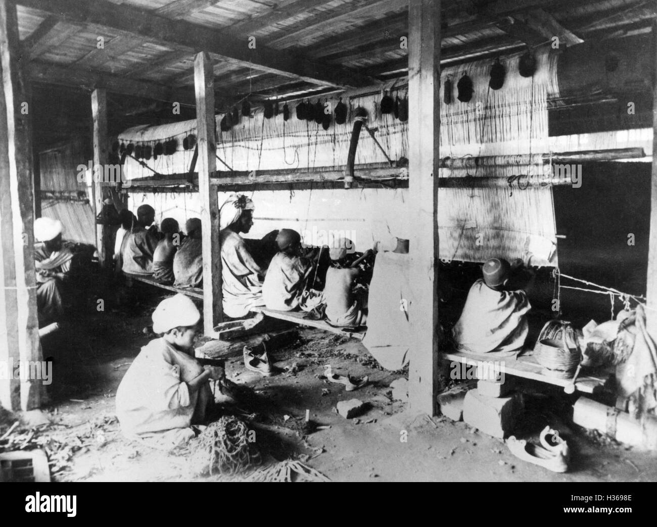 Child labour in a carpet weaving mill in India Stock Photo Alamy
