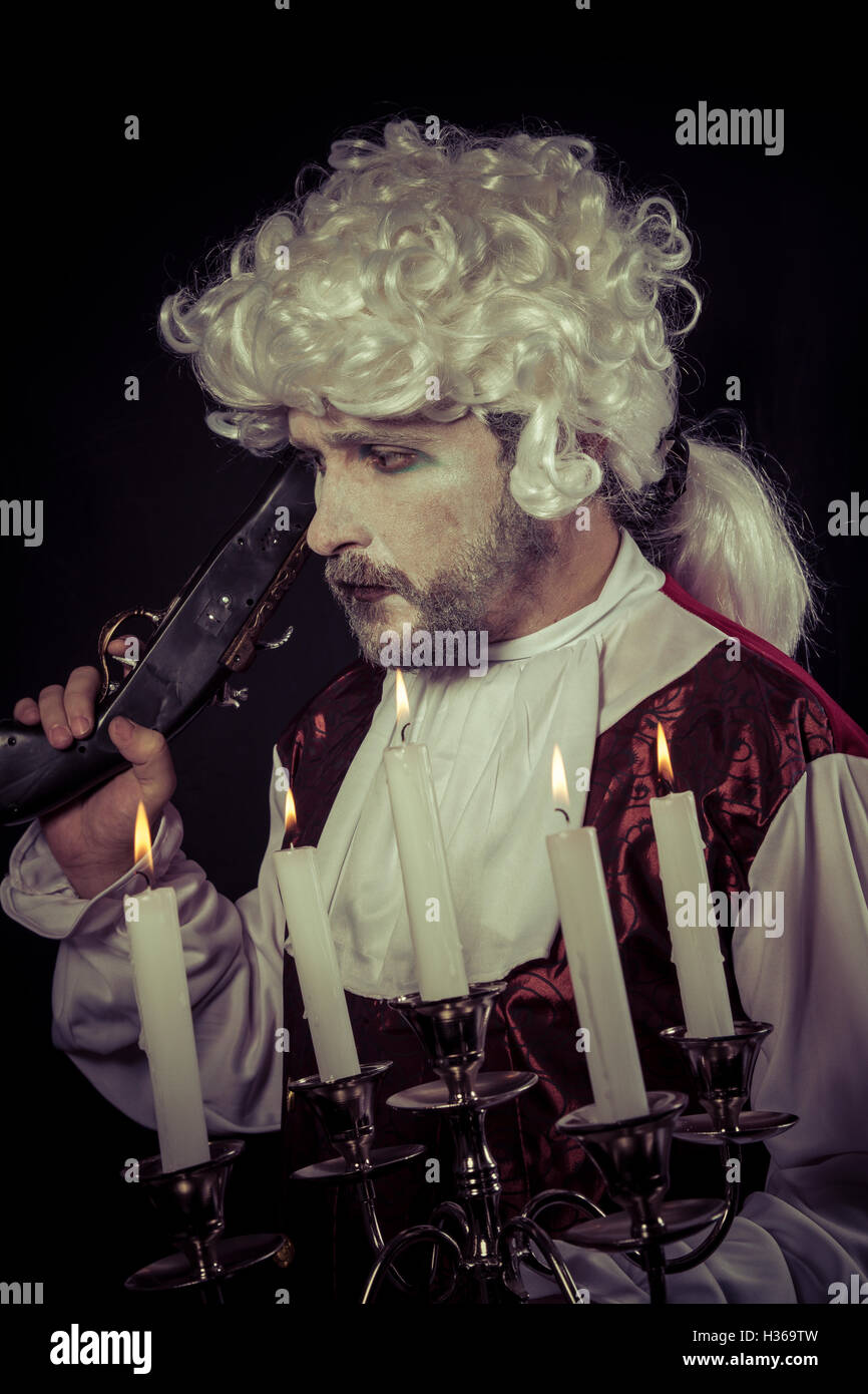 Gunfight, nineteenth century man, , chandelier with candles Stock Photo
