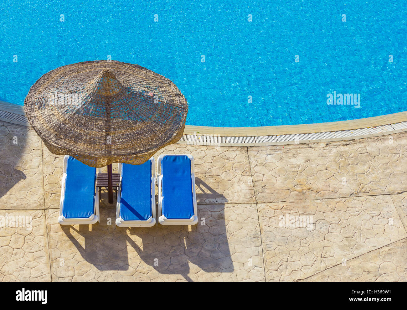 the pool, beach umbrellas and the Red Sea in Egypt Stock Photo