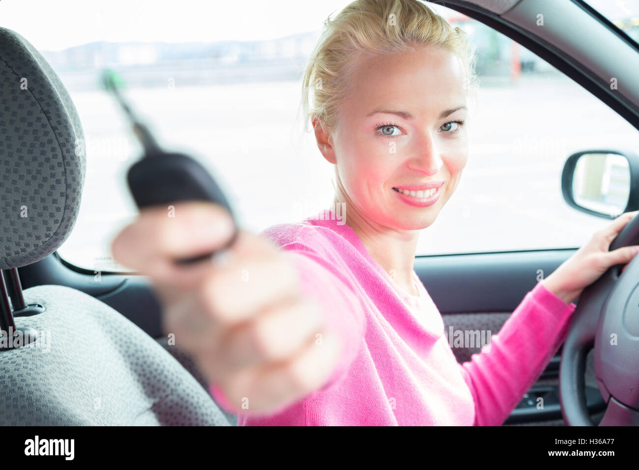 Woman driver showing car keys Stock Photo Alamy
