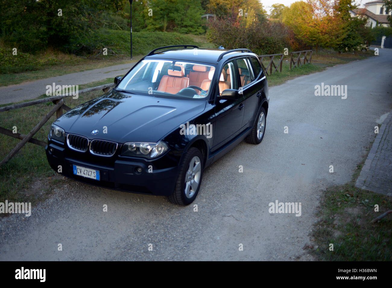 Car, BMW X3, cross country vehicle, SUV, 4x4, model year 2005-, black, driving, frontal view Stock Photo