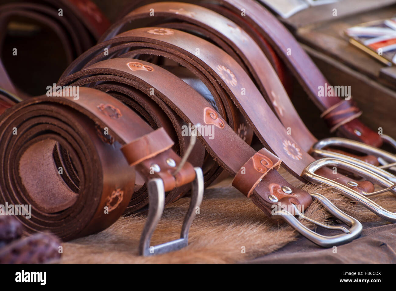 Store handmade  leather belts, spanish medieval fair Stock Photo