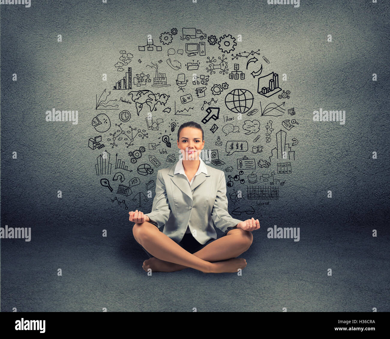 business woman meditating on floor Stock Photo - Alamy