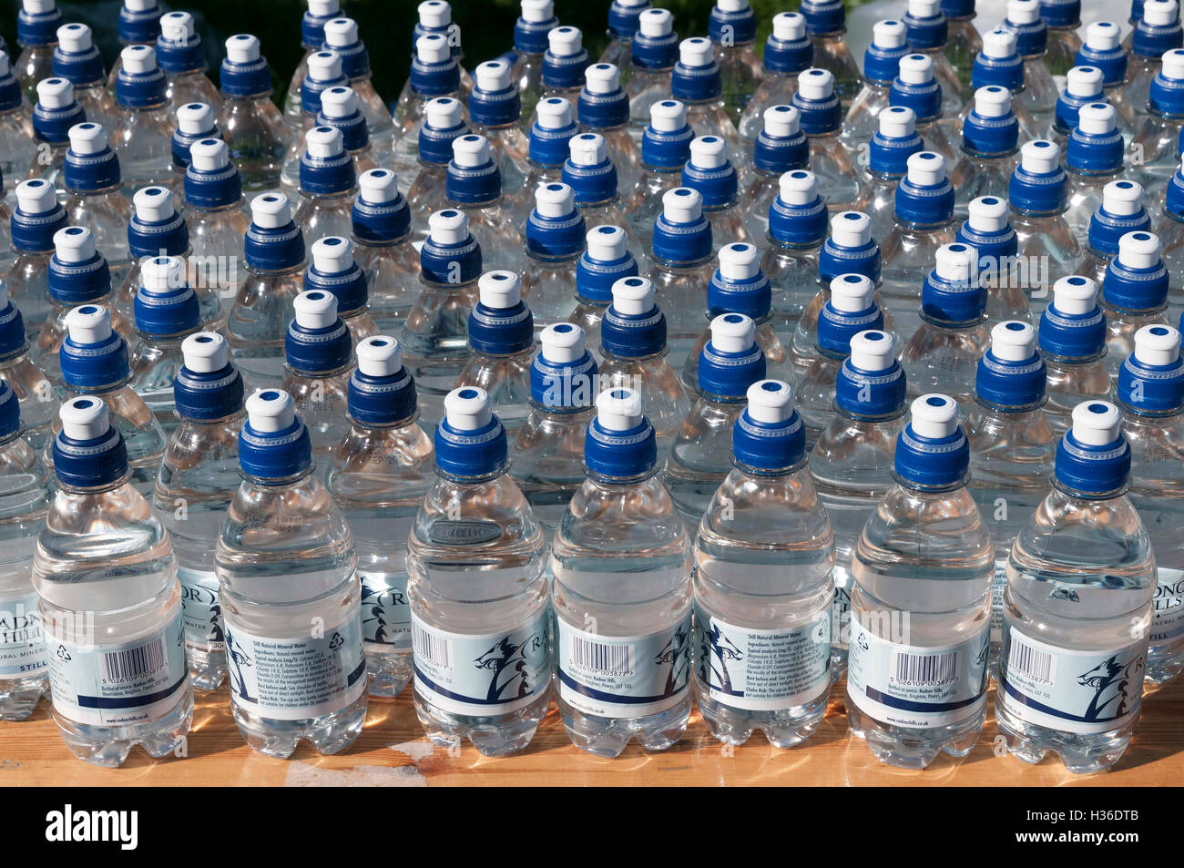 Water bottles. Mineral Sports tops Stock Photo