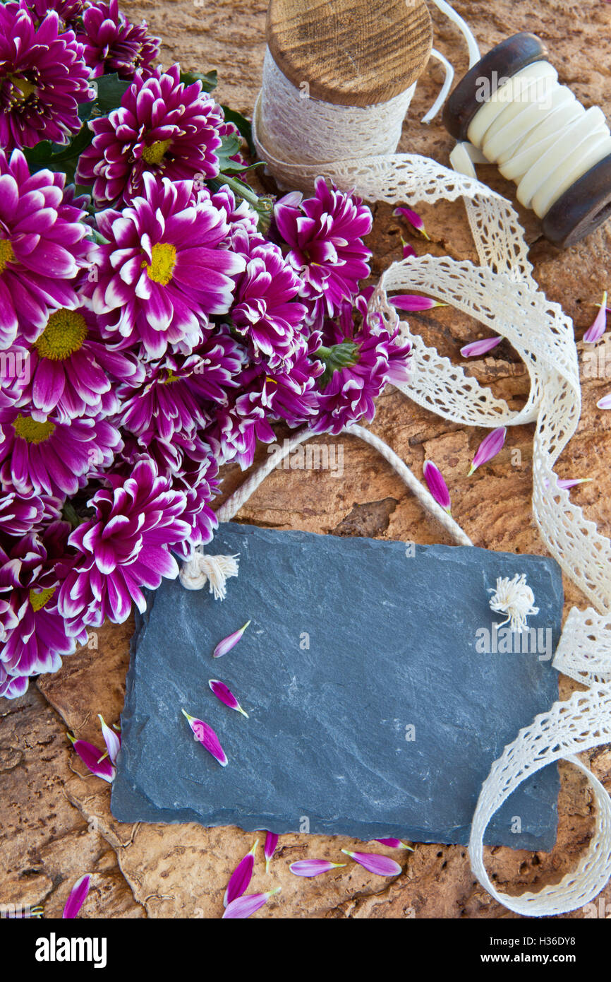 Fresh flowers on wooden background Stock Photo