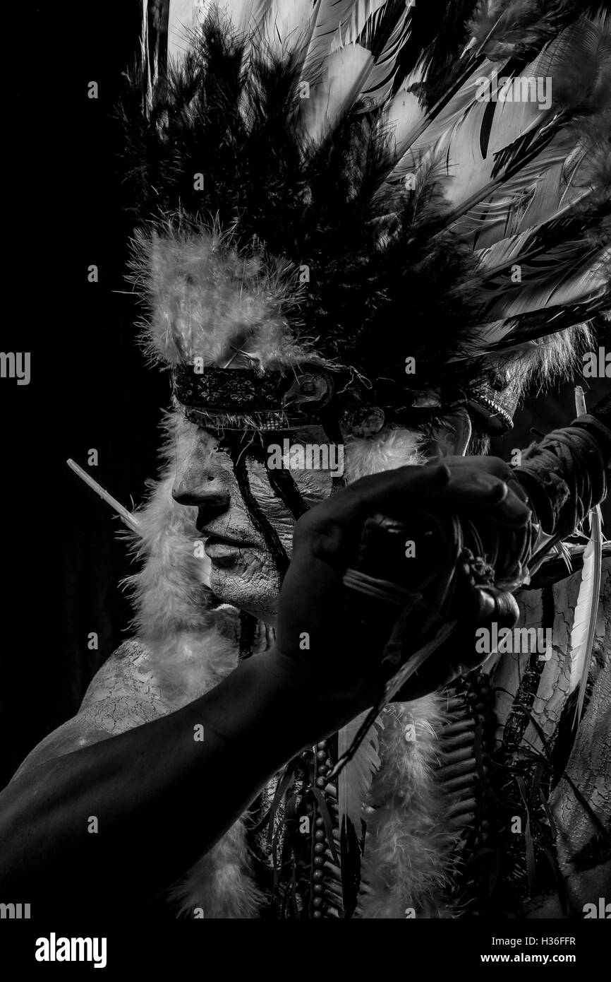 American Indian chief with big feather headdress, warrior Stock Photo