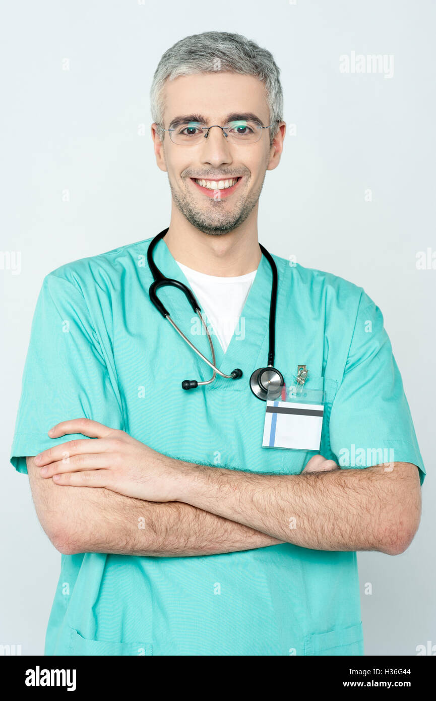 Young doctor folded arms smiling hi-res stock photography and images ...
