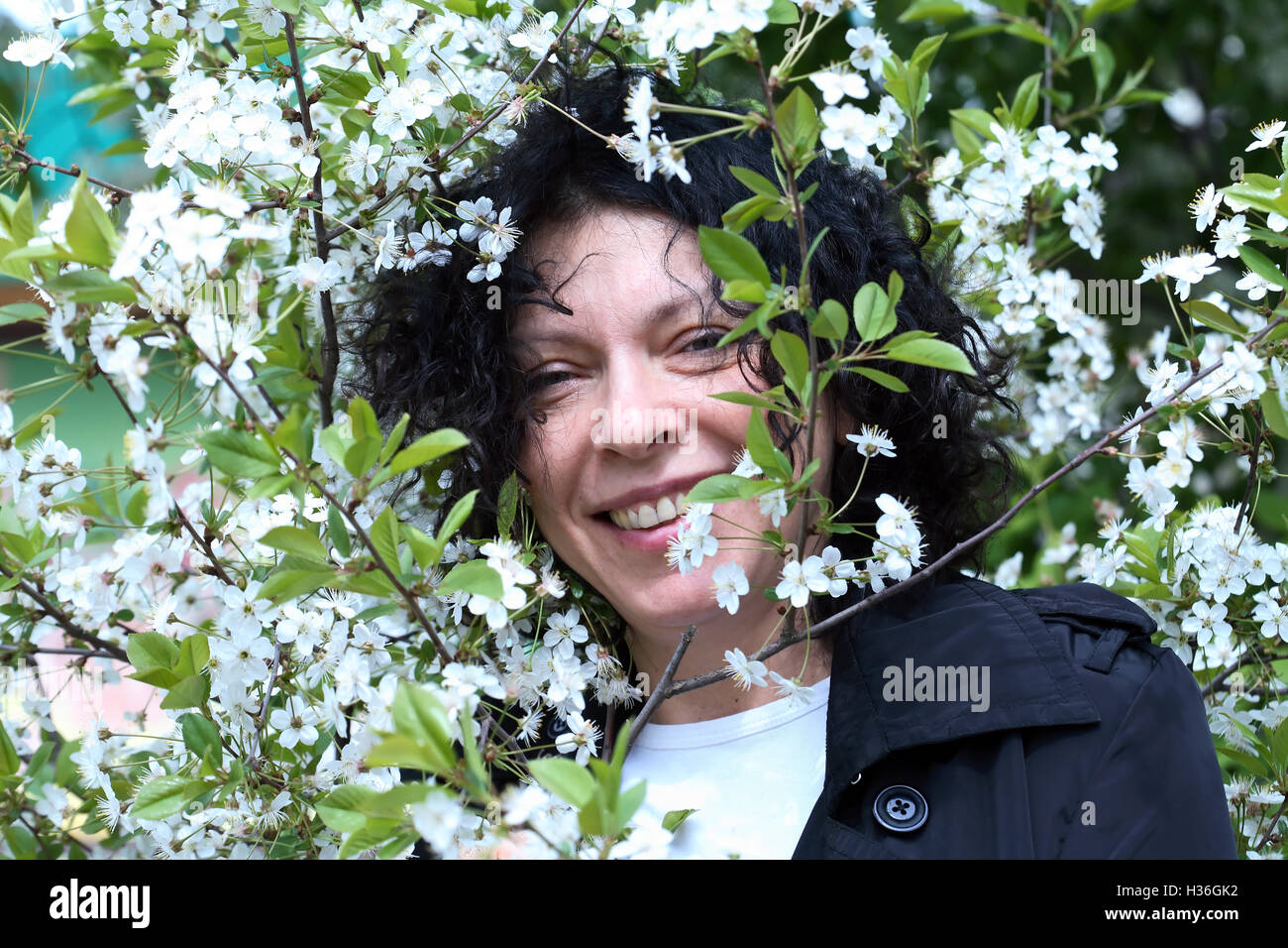 Lady In Flowers Stock Photo