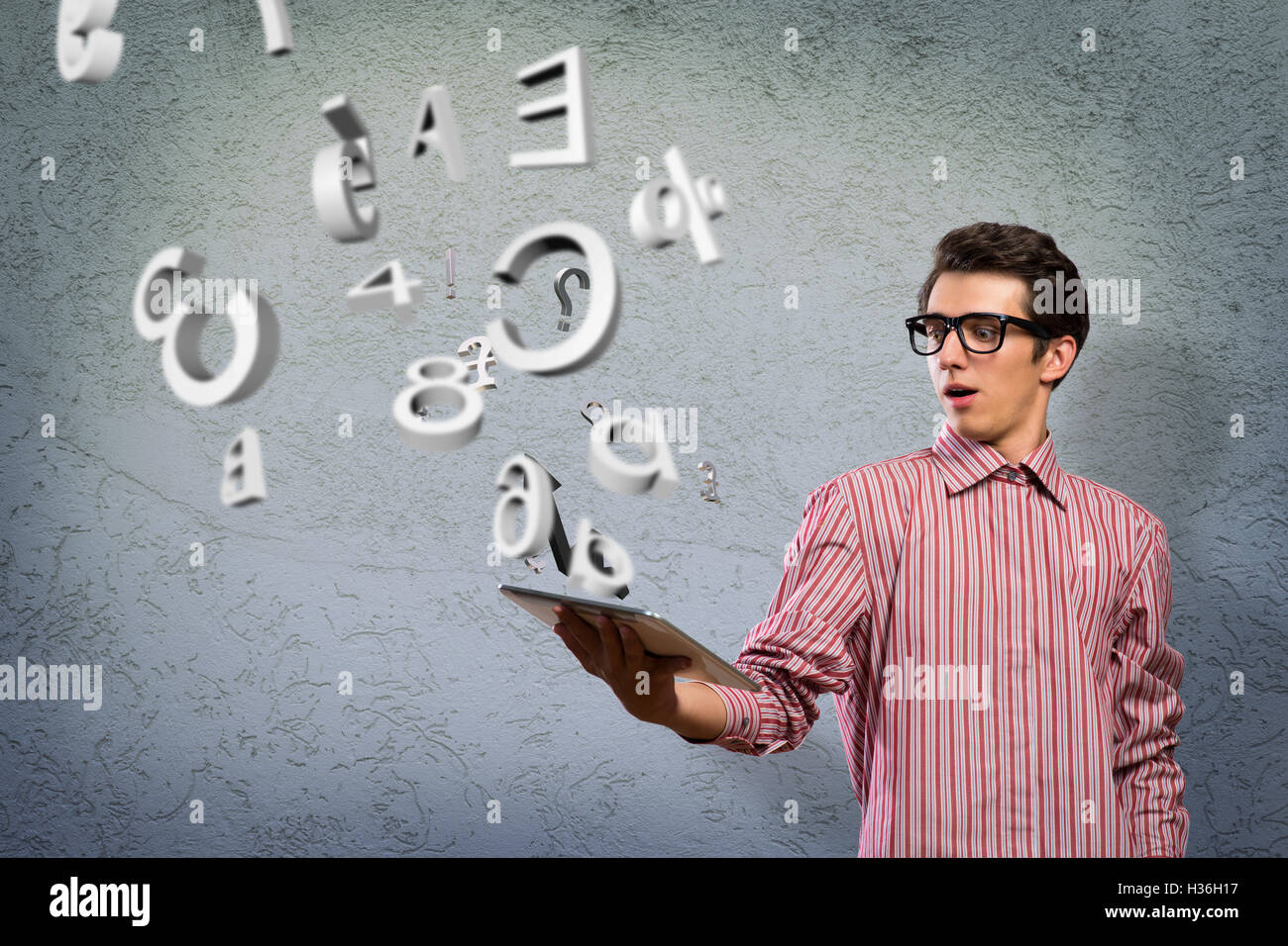 Young Man Using Tablet young man with tablet Stock Photo - Alamy