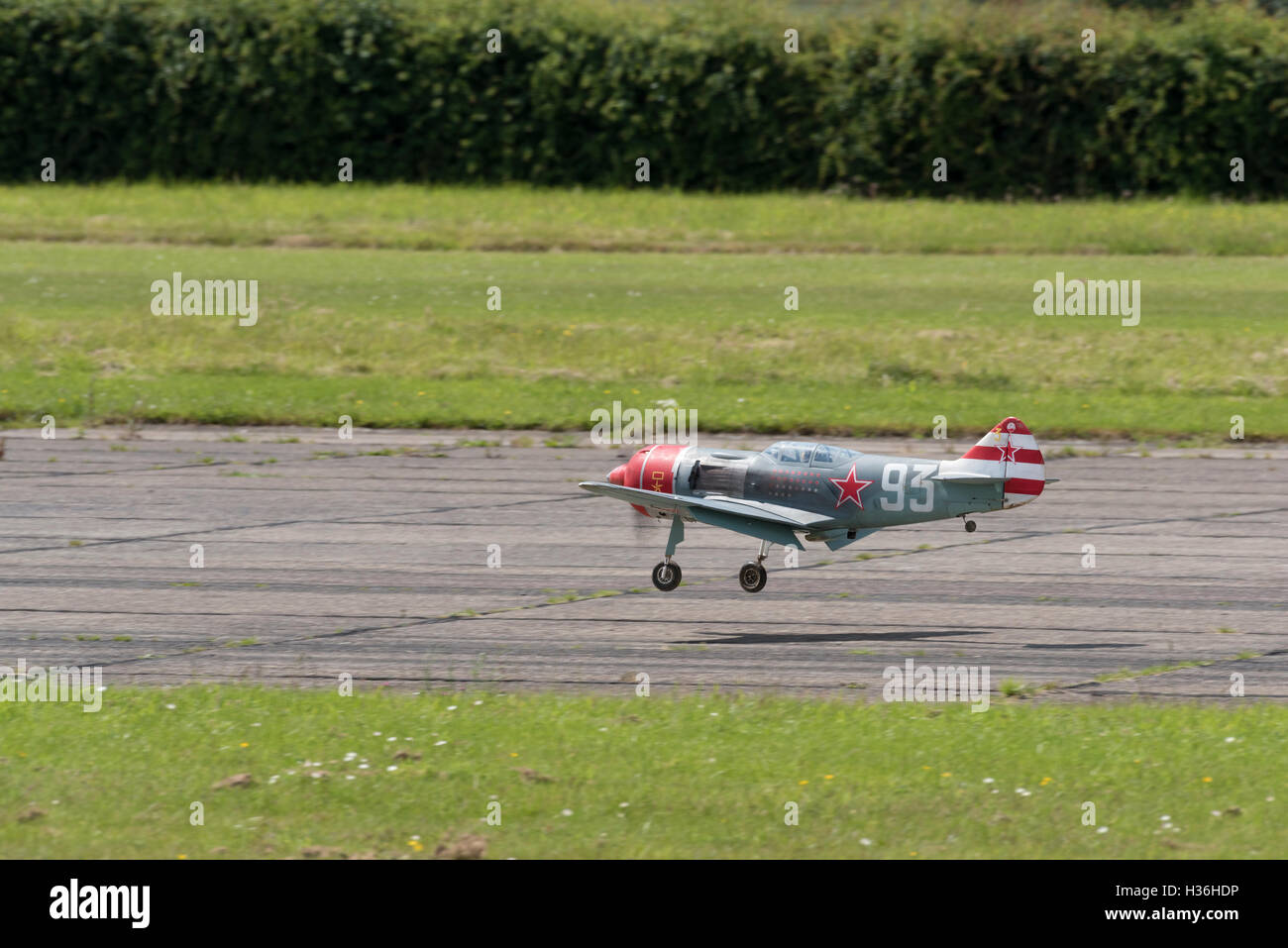 Radio controlled model of Soviet world war two fighter plane landing at Wings 'n' Wheels North Weald airfield Epping Essex Stock Photo