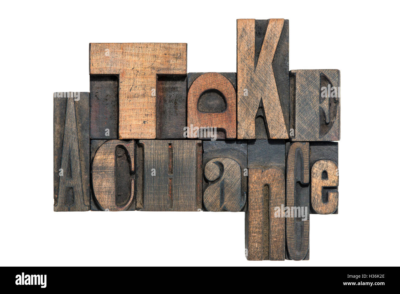 take a chance phrase made from mixed wooden letterpress type isolated on white Stock Photo