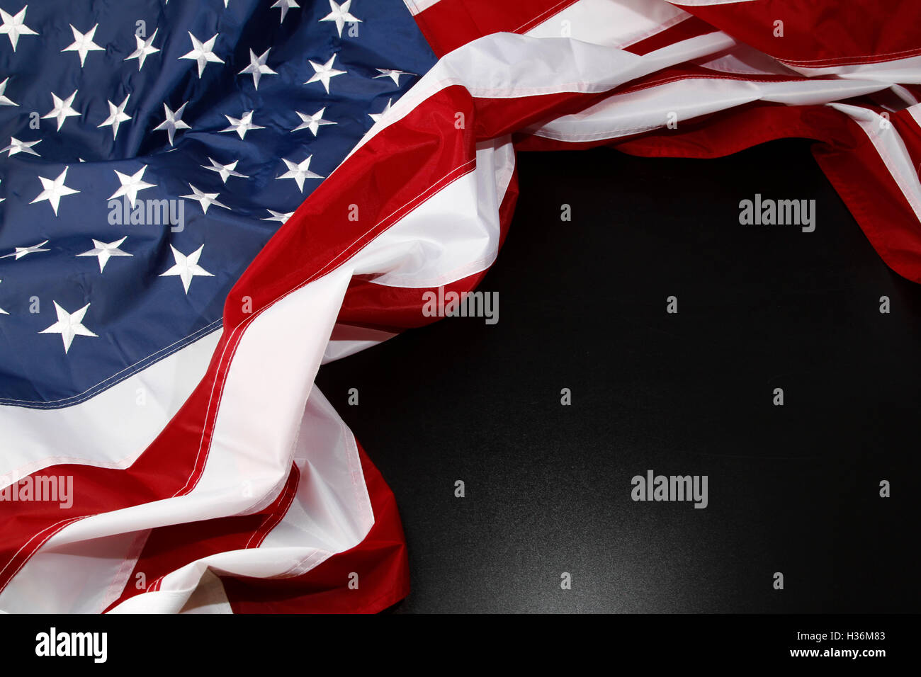 Closeup of American flag on black background Stock Photo - Alamy