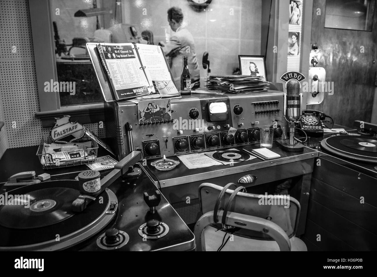 A 'frozen in time' look inside Sam Phillips' vintage recording booth full of equipment & turntables & photos at Sun Records Studio in Memphis, TN, Stock Photo