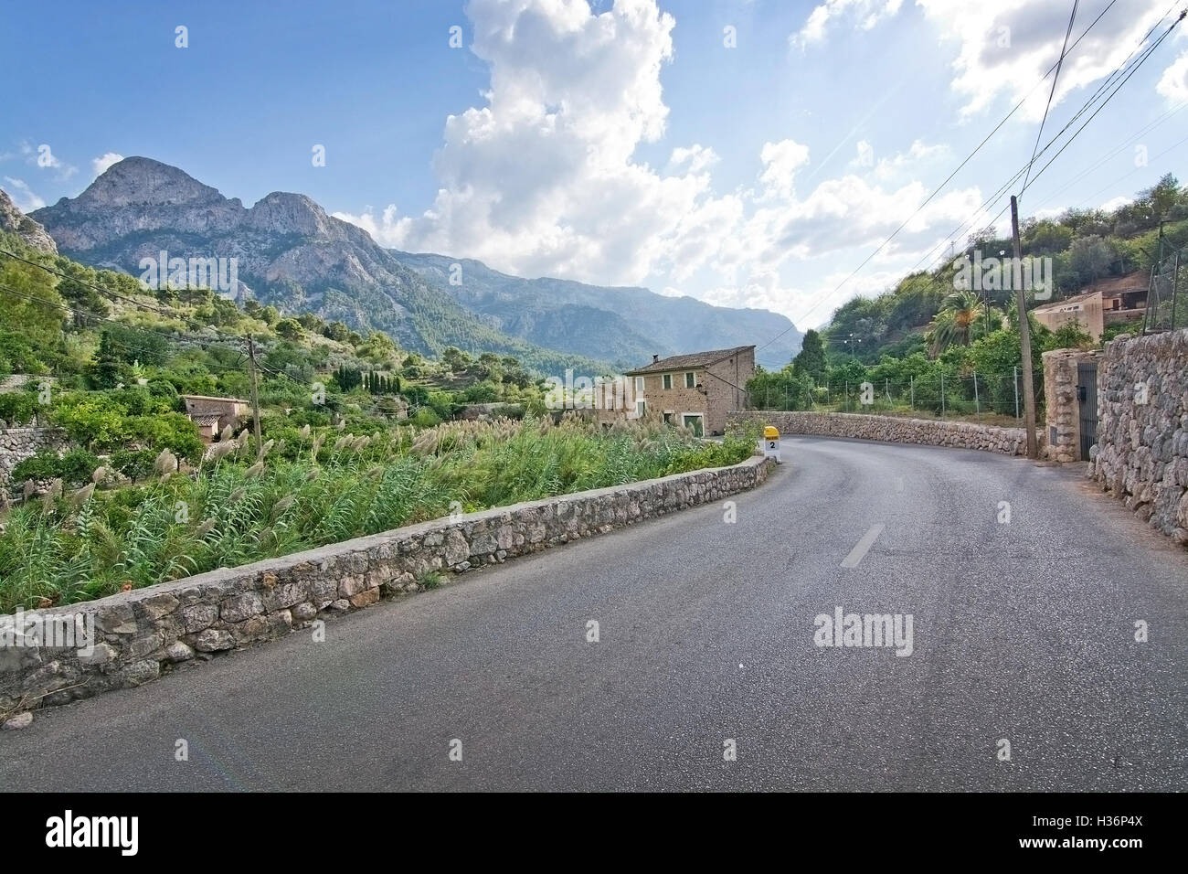 Mountain landscape with empty asphalted road in Fornalutx, Mallorca, Balearic islands, Spain. Stock Photo