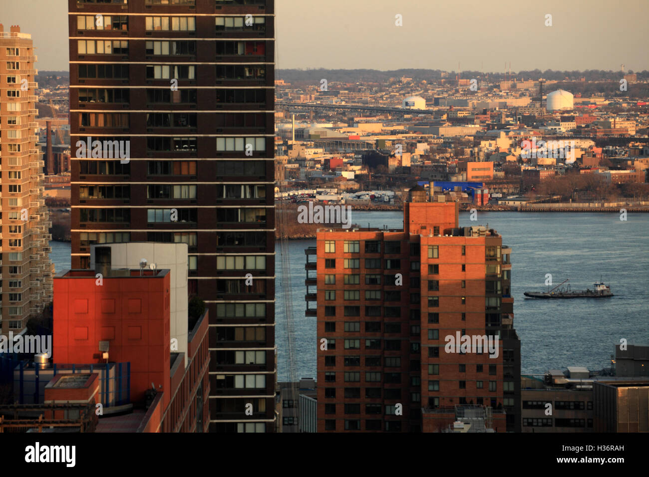 The view of Midtown high rise buildings before sunset with a boat in ...
