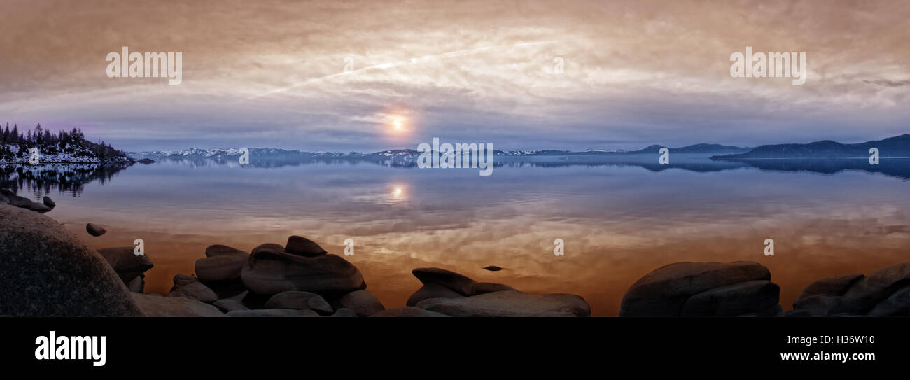 Winter sunset at Lake Tahoe, famous tourist destination on the border