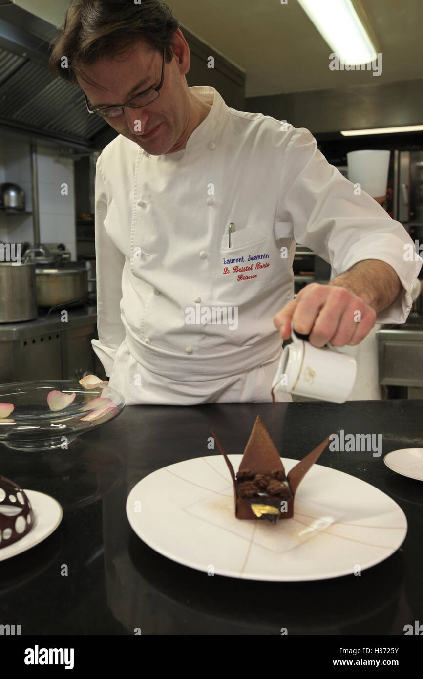 Pastry chef Laurent Jeannin working in the kitchen of 3 Michelin stared restaurant Epicure in Hotel Le Bristol,Paris,France Stock Photo