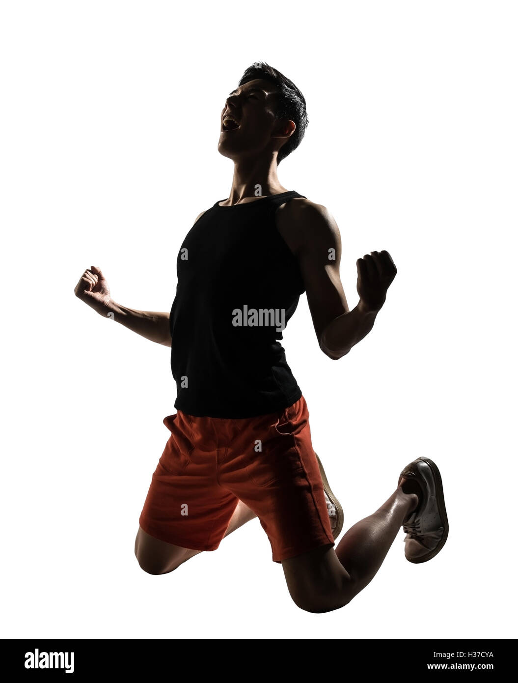 young athletic man kneeling Stock Photo