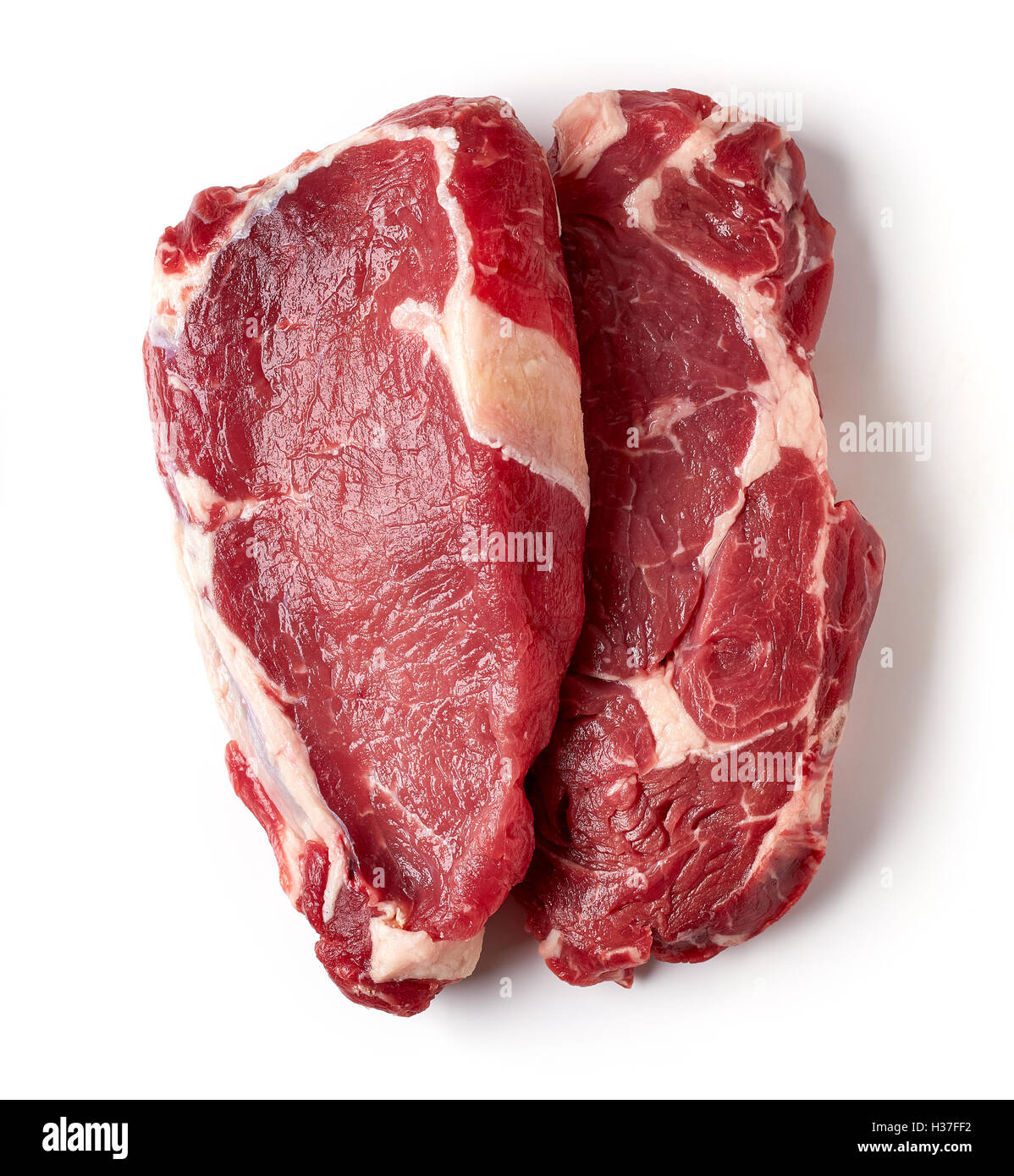 Fresh raw beef steak isolated on white background, top view Stock Photo