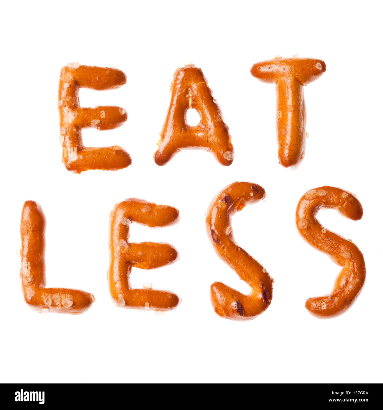 Alphabet pretzel written words EAT LESS isolated Stock Photo Alamy