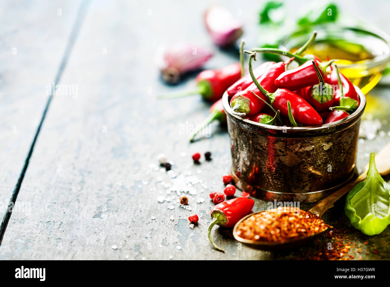 chili peppers with herbs and spices Stock Photo Alamy