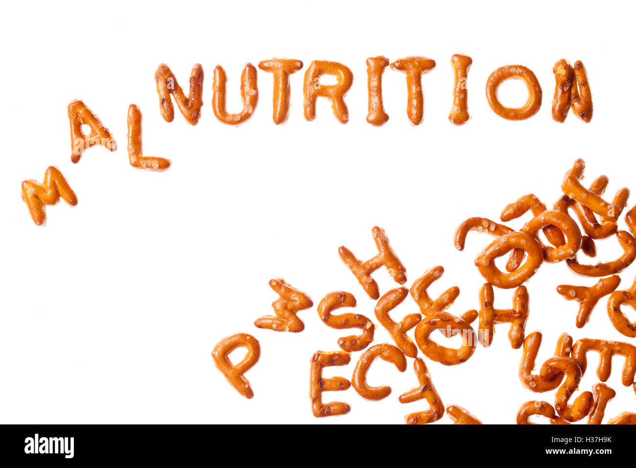 Alphabet pretzels and word malnutrition isolated stock photo alamy