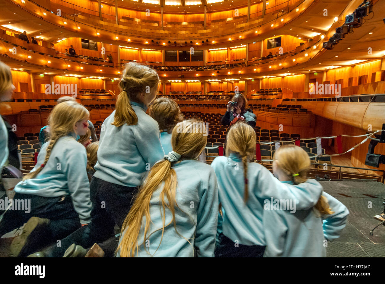 Local schoolchildren inside the auditorium at Glyndebourne Festival Opera Stock Photo