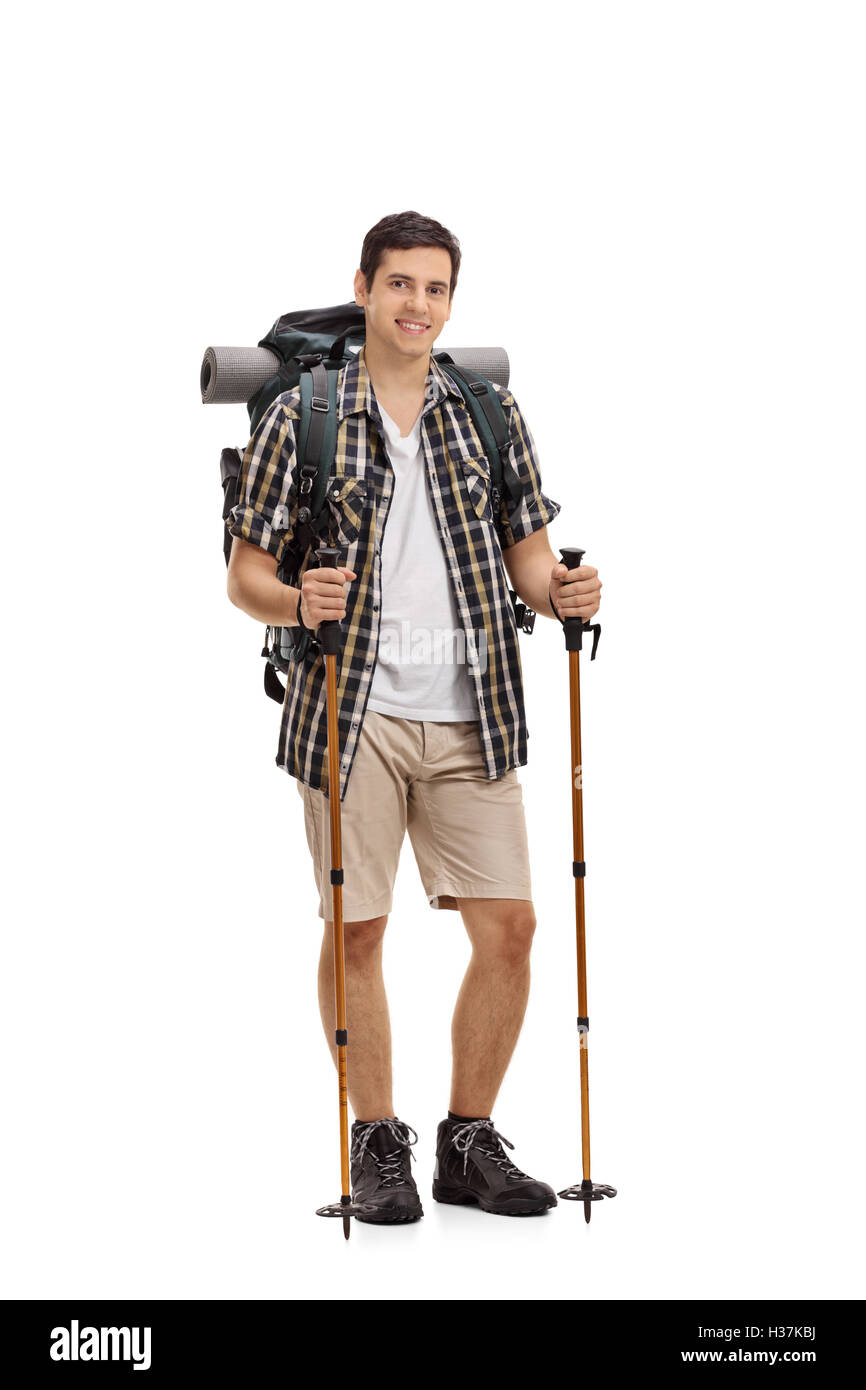 Full length portrait of a male hiker posing with hiking equipment ...
