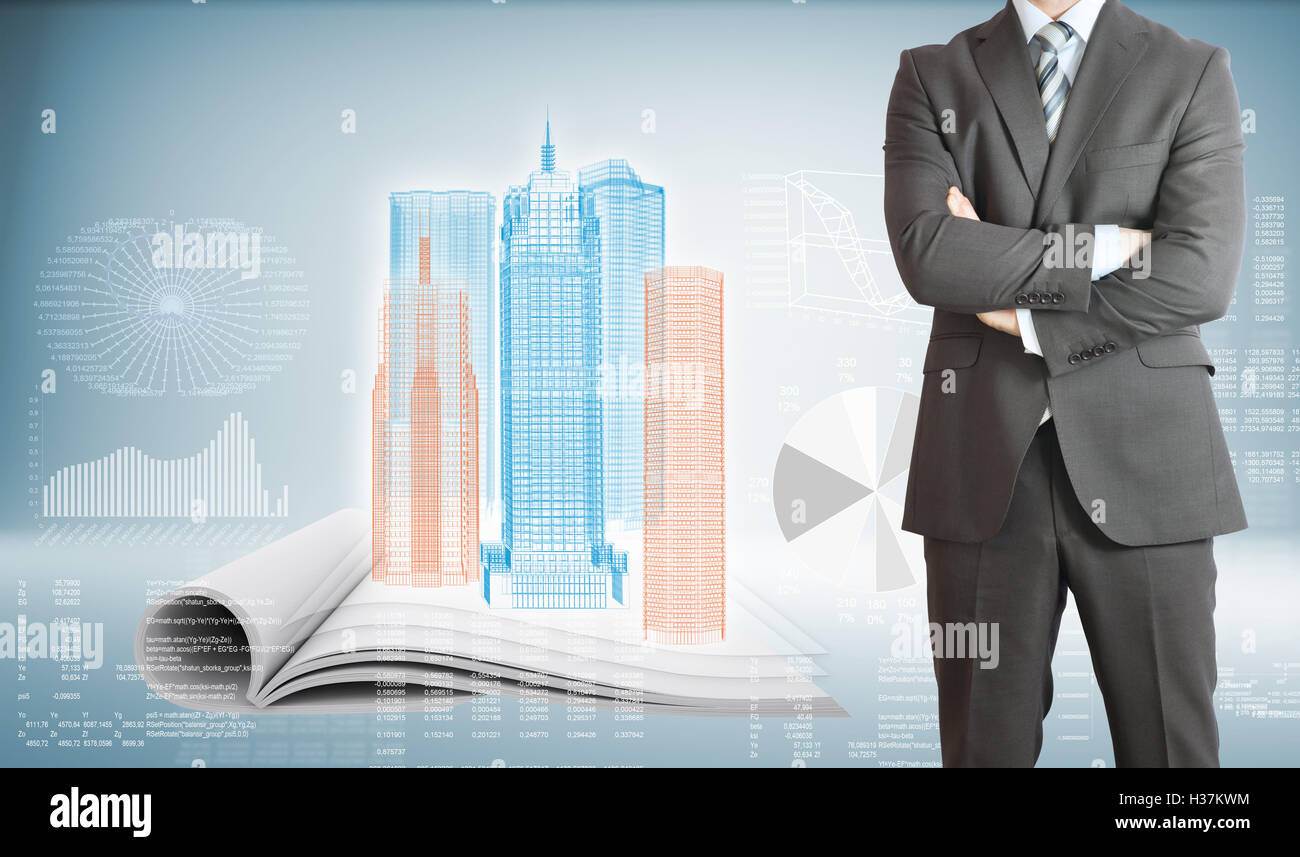 Businessman with skyscrapers, book and graphs Stock Photo - Alamy