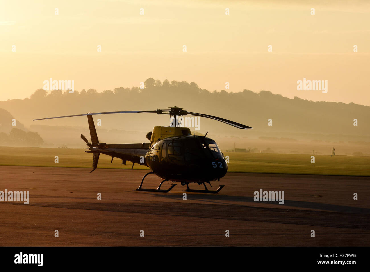 Army Air Corps Squirrel Helicopter shot at dawn on the airfield at Middle Wallop. MOD 451 Stock Photo