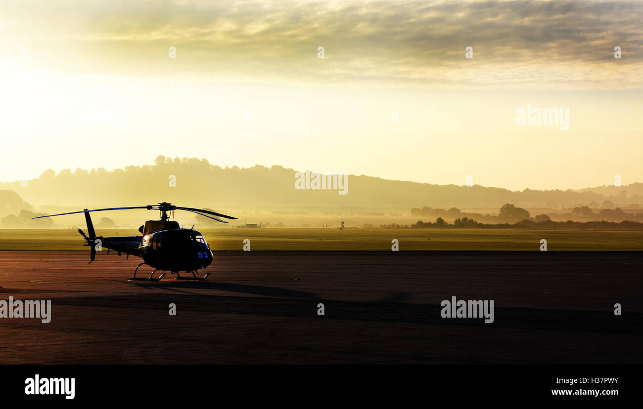 Army Air Corps Squirrel Helicopter shot at dawn on the airfield at Middle Wallop. MOD 451 Stock Photo