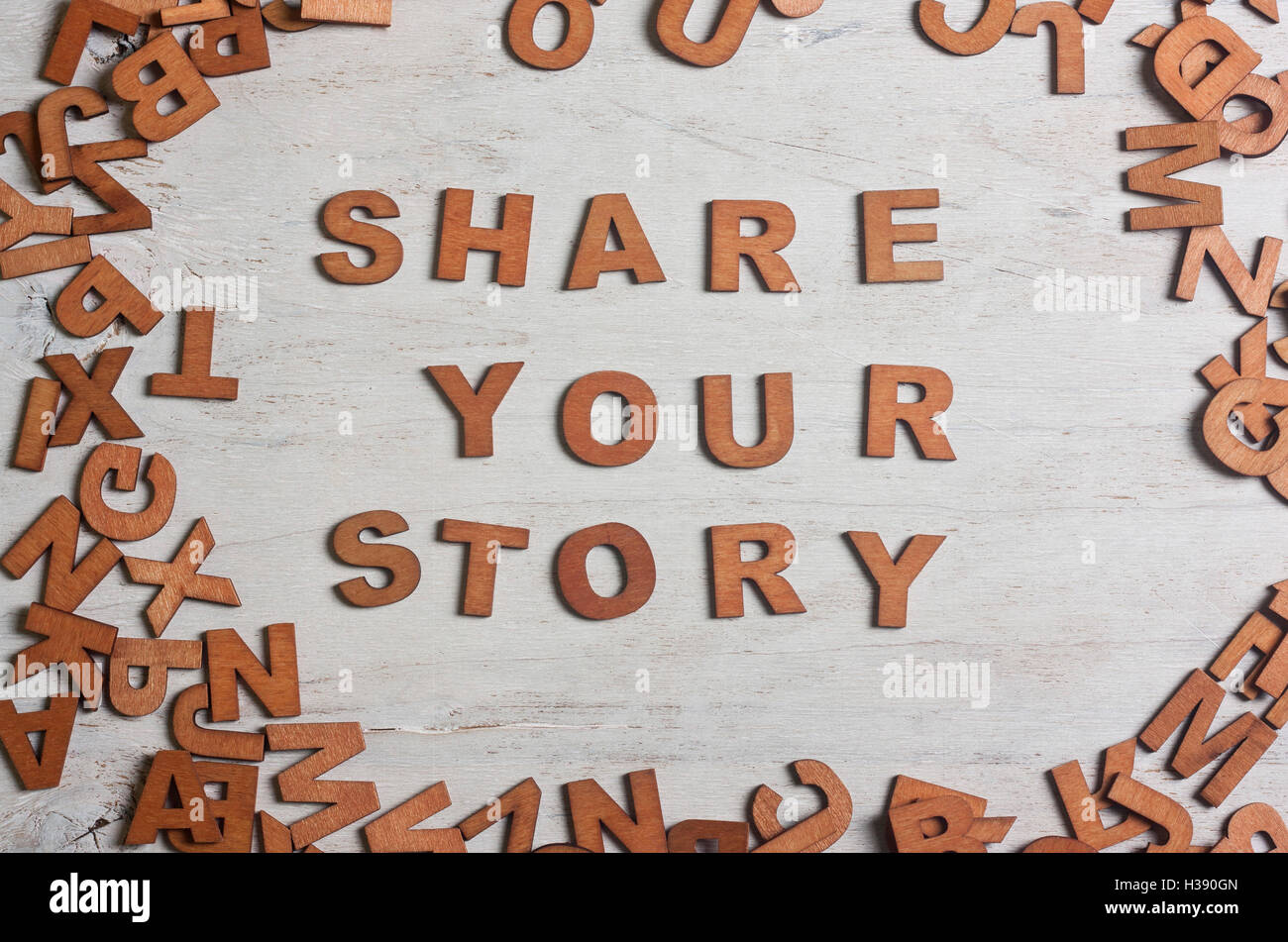 share your story It is written wooden letters Stock Photo
