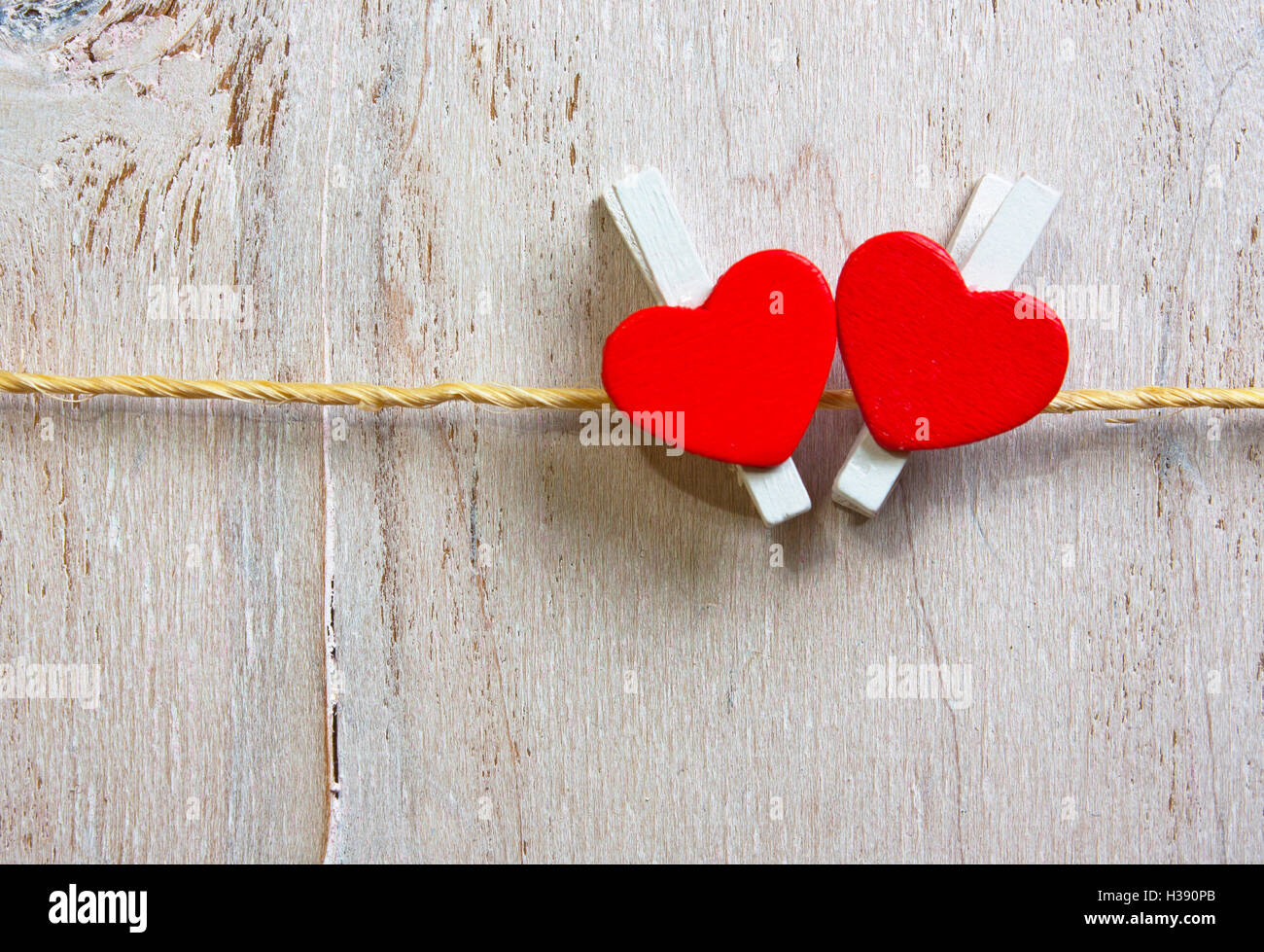 Two lovely red hearts. On old white wood background Stock Photo - Alamy