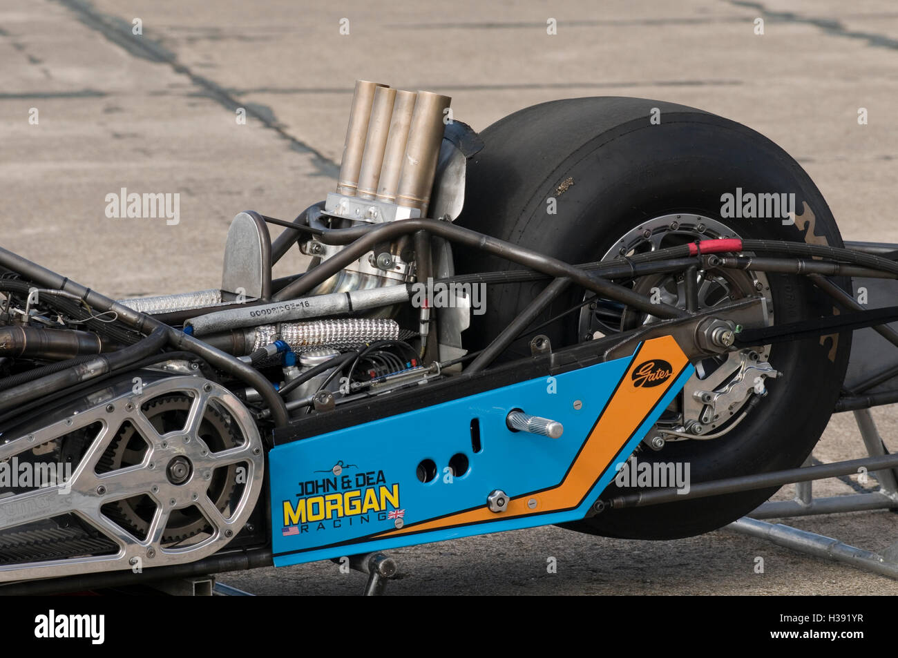 Ian King 10 time European Top Fuel Motorcycle drag racing  champion, slick racing tire and upward pointing exhaust, to produce d Stock Photo
