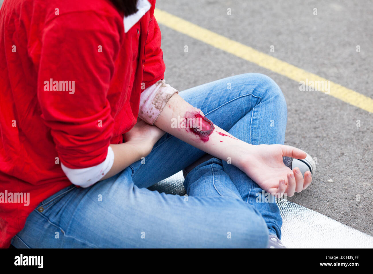 First aid training. Hand injury. Stage makeup. Stock Photo