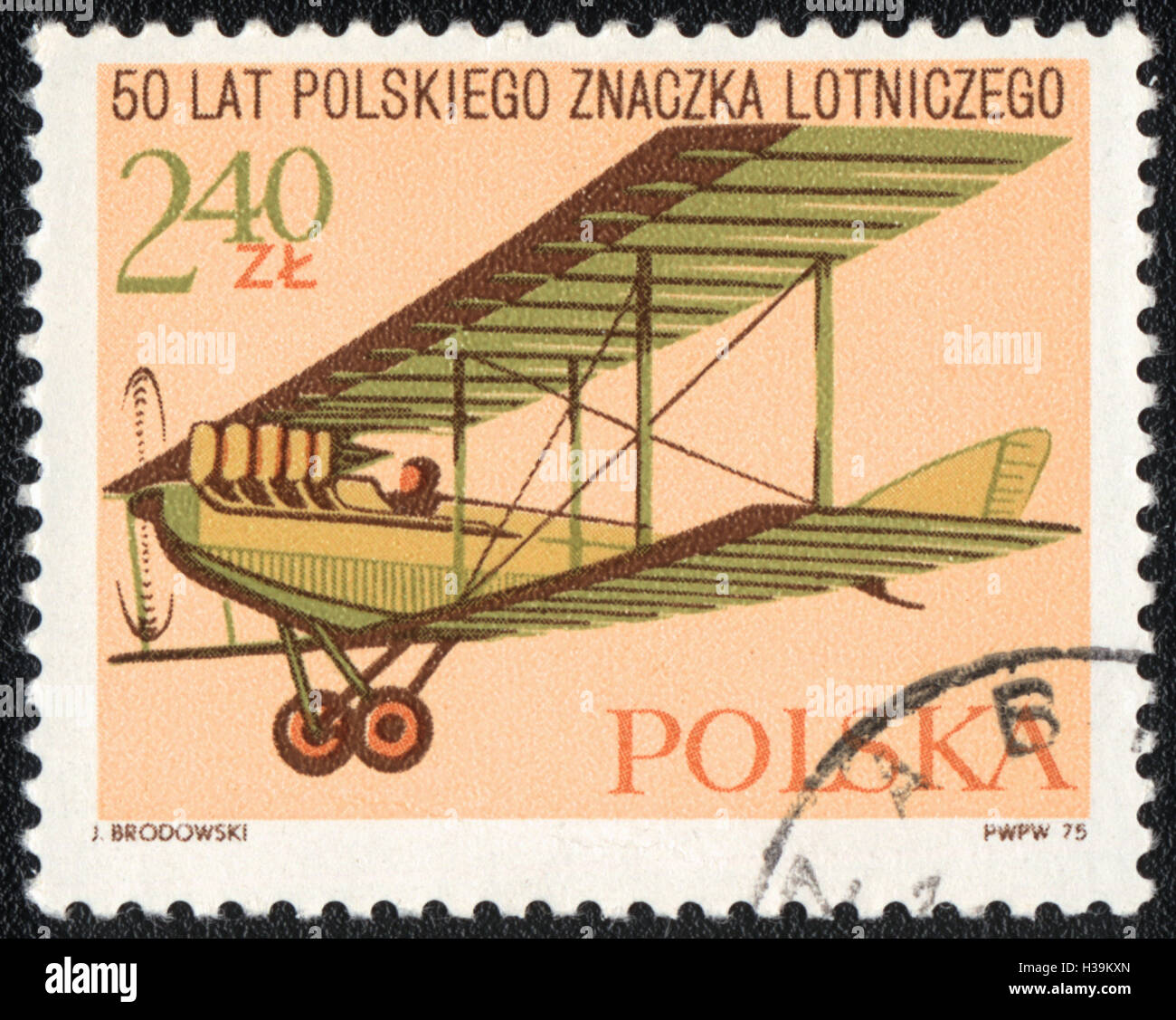 A stamp printed in Poland shows vintage airplane, devoted to 50 years of Polish flight sign, circa 1975 Stock Photo