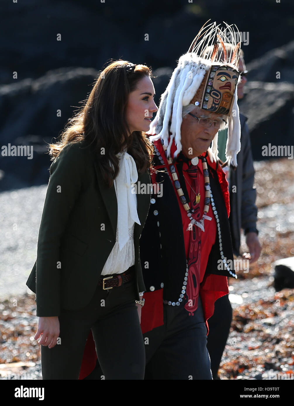 The Duchess of Cambridge walk up the beach after arriving by boat to Haida Gwaii on the seventh day of their visit to Canada. Stock Photo