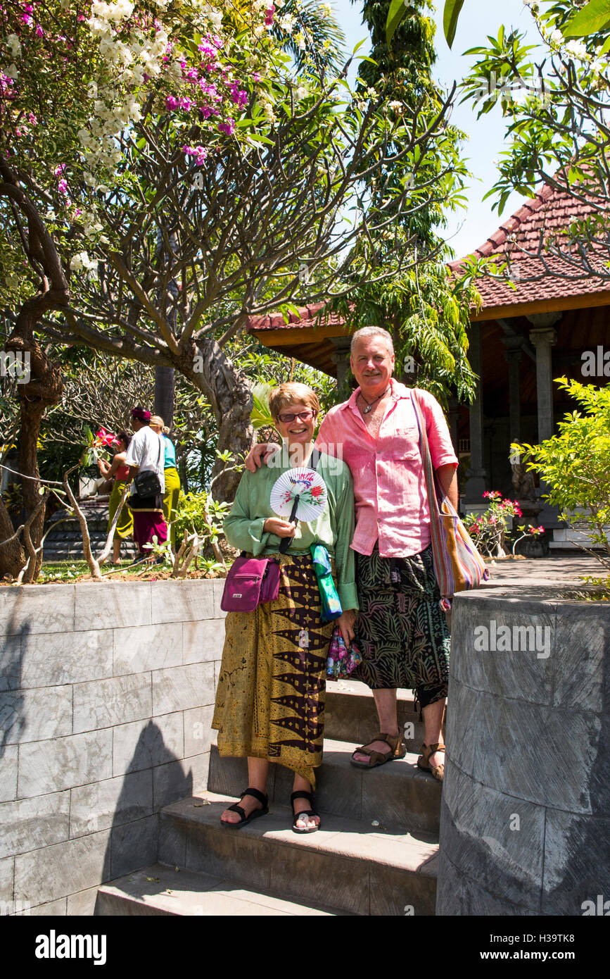 Indonesia, Bali, Banjar, Brahma Vihara Arama, Buddhist monastery, tourists wearing respectful clothes Stock Photo