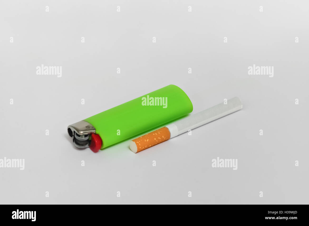 Closeup of requisites of a smoker placed on a bright background Stock Photo