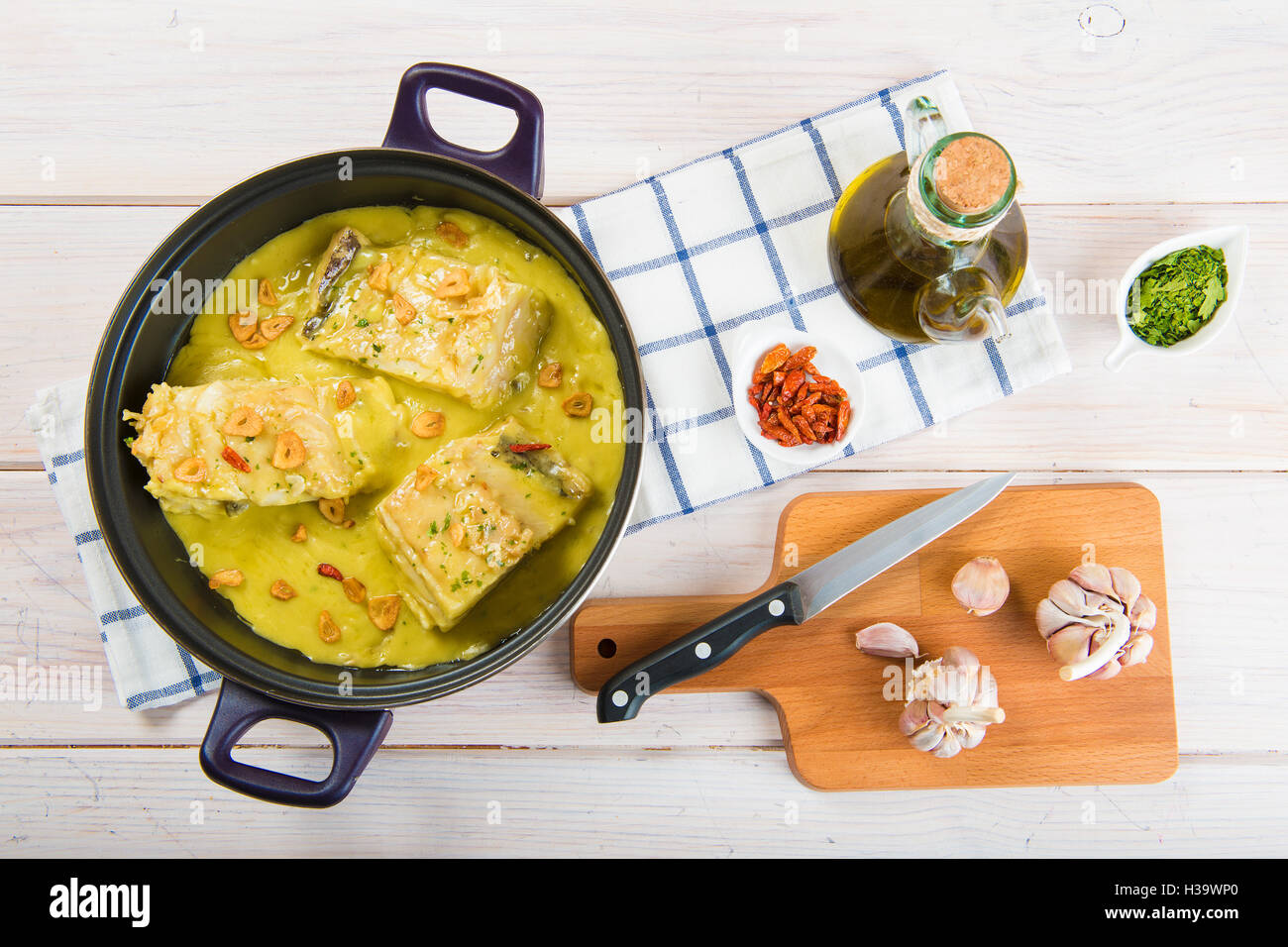 Salt cod in a pilpil sauce a typical Spanish recipe Stock Photo Alamy